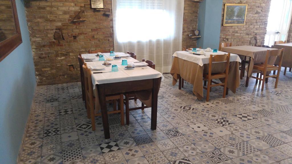 Relais Il Giardino Fra Gli Ulivi Villa โทริโนดิซานโกร ภายนอก รูปภาพ